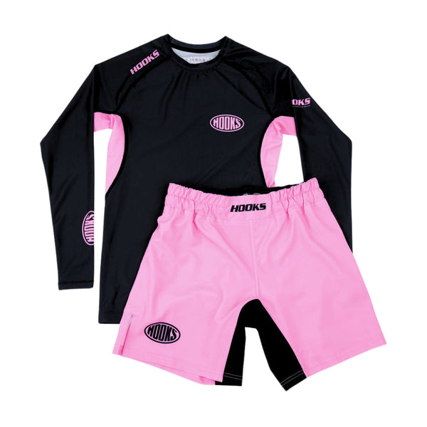 Hooks Rose Fusion Shorts, front flat lay paired with matching black and pink long-sleeve rash guard