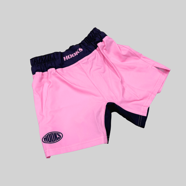 Hooks Kids Rose Fusion Shorts, front flat lay in pink with navy waistband and side panels
