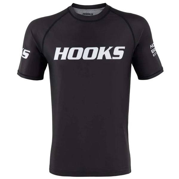 Hooks Competitor No-Gi Bundle, front view of black short-sleeve rash guard with bold white Hooks chest logo and sleeve