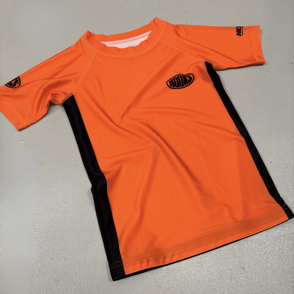 Hooks Kids Rash Guard Inferno, front flat lay in orange with black side panels and chest logo
