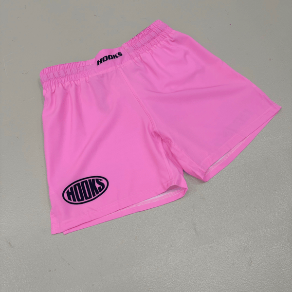 Hooks Sports Shorts Rose, front flat lay in solid pink with oval Hooks logo on left leg and branded elastic waistband