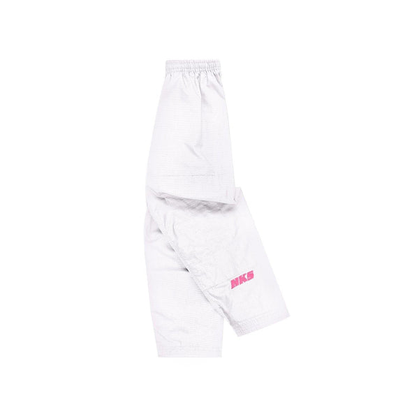 Hooks Kids Classic BJJ Gi pants, white ripstop fabric with pink HKS logo, folded flat lay showing elasticated waistband