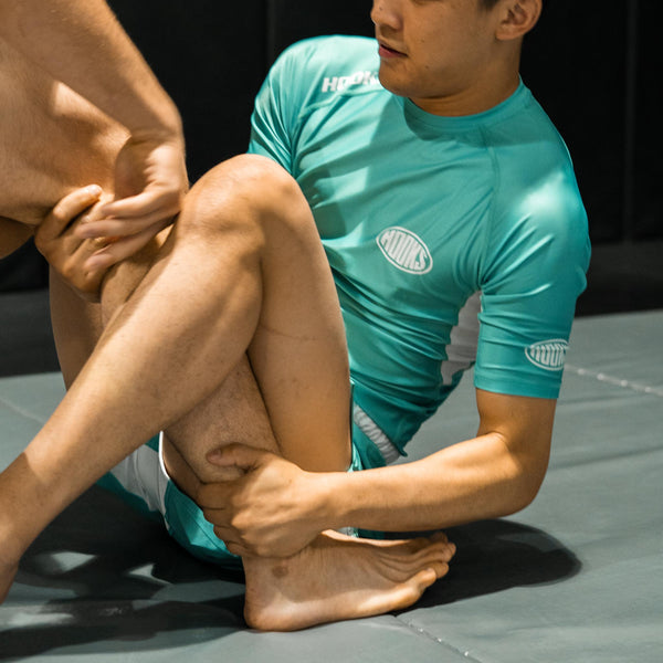 Hooks Teal Rash Guard