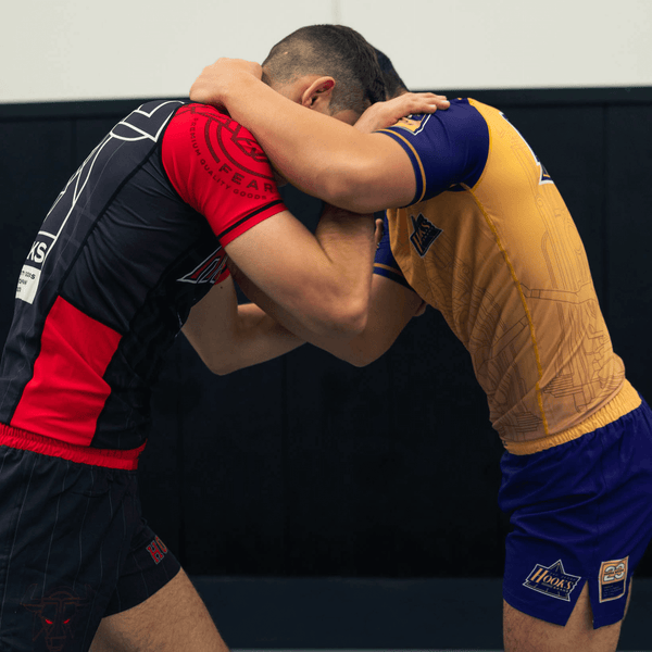 Yellow Showtime rashguard in action during training.