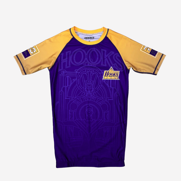 Purple and yellow sports jersey with 'HOOKS' branding on a white background
