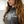 Close-up of Headstrong Hoodie chest print while worn