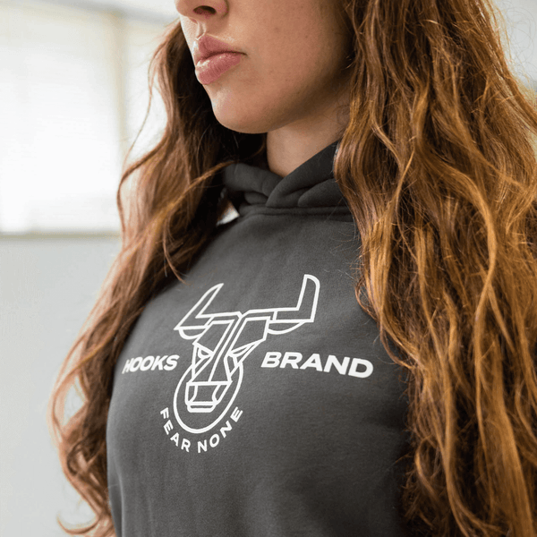 Close-up of Headstrong Hoodie chest print while worn
