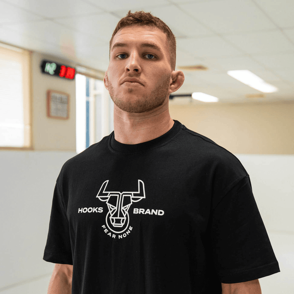 Close-up of front chest print on Hooks Headstrong Tee