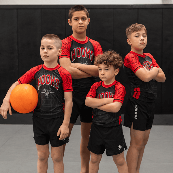 Alternate front view of Kids Headstrong Bulls Rashguard worn