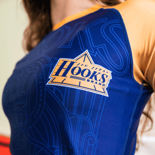 Close-up of the front print design on the purple Showtime rashguard.